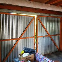 Before: Glavanised shed doors